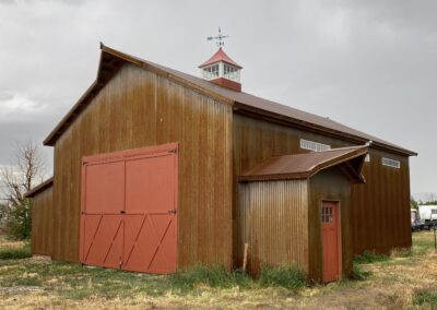 Brown Shed with Red Doors